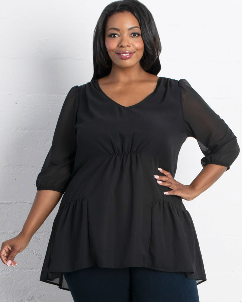 Front of a model wearing a size 0X Cheryl Chiffon Tunic Top in BLACK NOIR by Kiyonna. | dia_product_style_image_id:227475